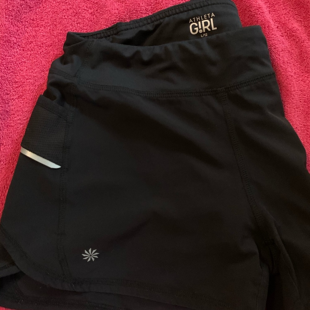 Athleta Girl black running short, size 12.